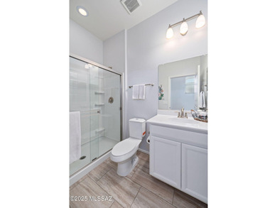 Discover modern desert living in this stunning 2 bedroom, 2.5 on Canoa Ranch Golf Club in Arizona - for sale on GolfHomes.com, golf home, golf lot