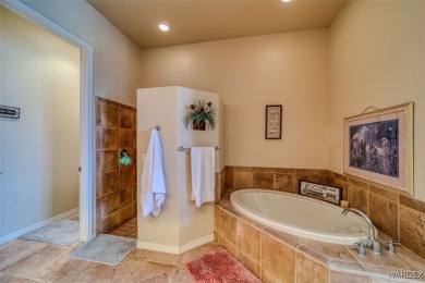 Imagine stepping into a stunning 3 bedroom 2 bath home nestled on Laughlin Ranch Golf Club in Arizona - for sale on GolfHomes.com, golf home, golf lot