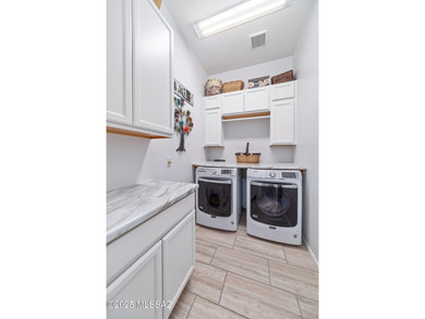 Discover modern desert living in this stunning 2 bedroom, 2.5 on Canoa Ranch Golf Club in Arizona - for sale on GolfHomes.com, golf home, golf lot