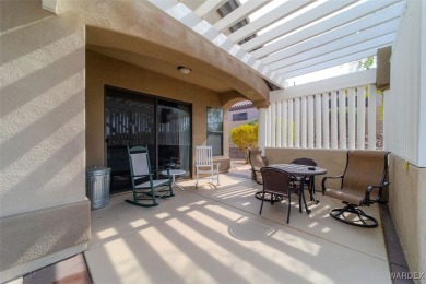 Imagine stepping into a stunning 3 bedroom 2 bath home nestled on Laughlin Ranch Golf Club in Arizona - for sale on GolfHomes.com, golf home, golf lot