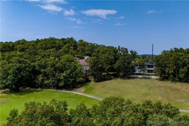 This charming Craftsman-style home, nestled in a prime location on Tan-Tar-A Golf Club in Missouri - for sale on GolfHomes.com, golf home, golf lot