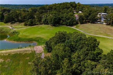 This charming Craftsman-style home, nestled in a prime location on Tan-Tar-A Golf Club in Missouri - for sale on GolfHomes.com, golf home, golf lot