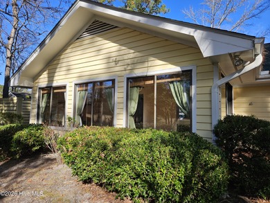 What a happy house! Bright and cheery to welcome you home! This on Carolina Shores Golf Course in North Carolina - for sale on GolfHomes.com, golf home, golf lot