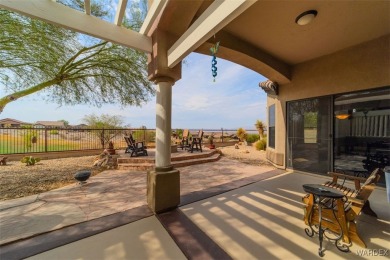 Imagine stepping into a stunning 3 bedroom 2 bath home nestled on Laughlin Ranch Golf Club in Arizona - for sale on GolfHomes.com, golf home, golf lot