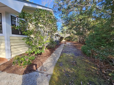 What a happy house! Bright and cheery to welcome you home! This on Carolina Shores Golf Course in North Carolina - for sale on GolfHomes.com, golf home, golf lot