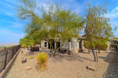 Imagine stepping into a stunning 3 bedroom 2 bath home nestled on Laughlin Ranch Golf Club in Arizona - for sale on GolfHomes.com, golf home, golf lot