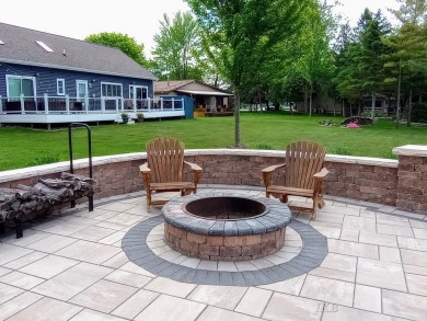 Stunning Waterfront Oasis on Lake Lancer! Welcome to your dream on Lakeside Golf Course in Michigan - for sale on GolfHomes.com, golf home, golf lot