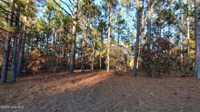 This stunning 2.67-acre parcel is a combination of two lots, lot on Foxfire Golf and Country Club in North Carolina - for sale on GolfHomes.com, golf home, golf lot