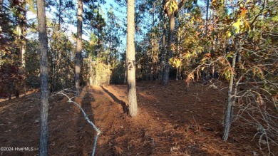 This stunning 2.67-acre parcel is a combination of two lots, lot on Foxfire Golf and Country Club in North Carolina - for sale on GolfHomes.com, golf home, golf lot