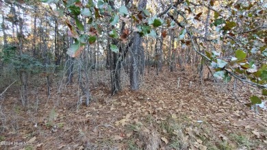 Don't miss this rare opportunity to own a 1.19-acre wooded lot on Foxfire Golf and Country Club in North Carolina - for sale on GolfHomes.com, golf home, golf lot