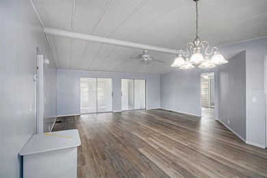 One or more photo(s) has been virtually staged. IMPROVED PRICE on Zellwood Station Country Club in Florida - for sale on GolfHomes.com, golf home, golf lot