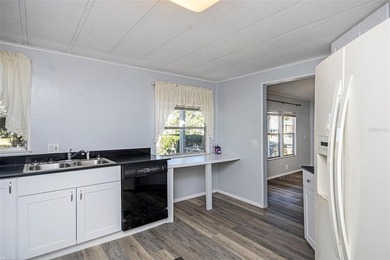 One or more photo(s) has been virtually staged. IMPROVED PRICE on Zellwood Station Country Club in Florida - for sale on GolfHomes.com, golf home, golf lot