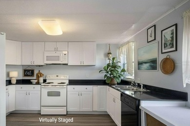 One or more photo(s) has been virtually staged. IMPROVED PRICE on Zellwood Station Country Club in Florida - for sale on GolfHomes.com, golf home, golf lot