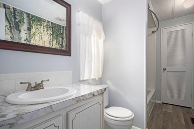 One or more photo(s) has been virtually staged. IMPROVED PRICE on Zellwood Station Country Club in Florida - for sale on GolfHomes.com, golf home, golf lot