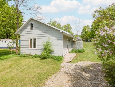 What a great little starter home or a place to hang your hat on George Young Golf Course in Michigan - for sale on GolfHomes.com, golf home, golf lot