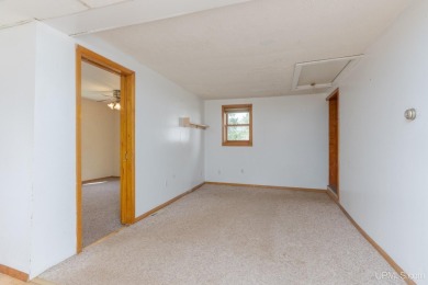 What a great little starter home or a place to hang your hat on George Young Golf Course in Michigan - for sale on GolfHomes.com, golf home, golf lot