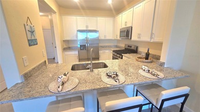 This beautifully maintained 3-bedroom, 2.5-bath townhouse is on Lakewood National Golf Club in Florida - for sale on GolfHomes.com, golf home, golf lot