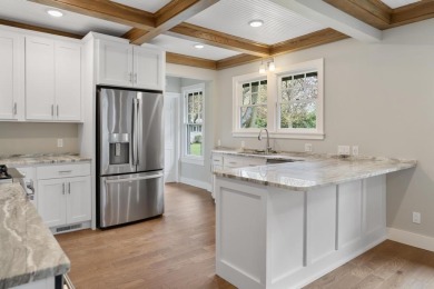 This brilliantly restored home delivers comfort, charm, and on Charlevoix Golf Club in Michigan - for sale on GolfHomes.com, golf home, golf lot