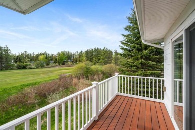 Welcome to this upper-level 2-bedroom, 2-bath condo in the on Charlevoix Golf and Country Club in Michigan - for sale on GolfHomes.com, golf home, golf lot