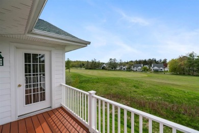 Welcome to this upper-level 2-bedroom, 2-bath condo in the on Charlevoix Golf and Country Club in Michigan - for sale on GolfHomes.com, golf home, golf lot