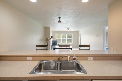 Welcome to this upper-level 2-bedroom, 2-bath condo in the on Charlevoix Golf and Country Club in Michigan - for sale on GolfHomes.com, golf home, golf lot