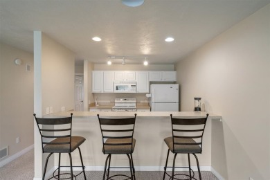 Welcome to this upper-level 2-bedroom, 2-bath condo in the on Charlevoix Golf and Country Club in Michigan - for sale on GolfHomes.com, golf home, golf lot