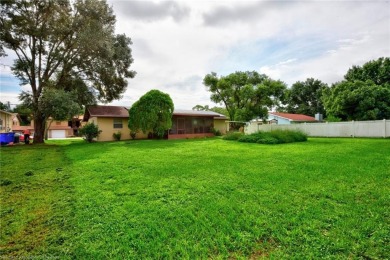 REDUCED TO UNDER $200,000! Wonderful Lake Haven Estates Home on Harder Hall Golf and Country Club  in Florida - for sale on GolfHomes.com, golf home, golf lot