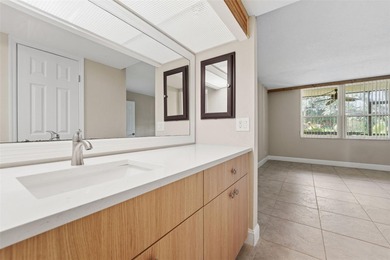 Beautifully updated 1-bedroom, 1.5-bath condo with stunning golf on Cove Cay Country Club in Florida - for sale on GolfHomes.com, golf home, golf lot