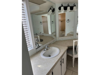Welcome to this charming home nestled in a vibrant 55+ gated on The Meadows At Countrywood in Florida - for sale on GolfHomes.com, golf home, golf lot