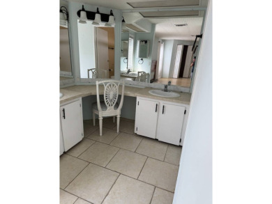 Welcome to this charming home nestled in a vibrant 55+ gated on The Meadows At Countrywood in Florida - for sale on GolfHomes.com, golf home, golf lot