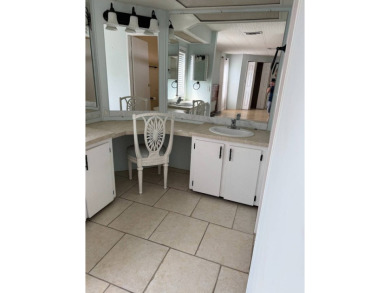 Welcome to this charming home nestled in a vibrant 55+ gated on The Meadows At Countrywood in Florida - for sale on GolfHomes.com, golf home, golf lot