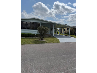Welcome to this charming home nestled in a vibrant 55+ gated on The Meadows At Countrywood in Florida - for sale on GolfHomes.com, golf home, golf lot
