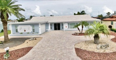 One or more photo(s) has been virtually staged. NO SHOES....NO on Gulf Harbors Golf Course in Florida - for sale on GolfHomes.com, golf home, golf lot