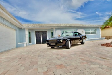 One or more photo(s) has been virtually staged. NO SHOES....NO on Gulf Harbors Golf Course in Florida - for sale on GolfHomes.com, golf home, golf lot