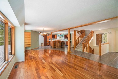 Perched at the crest of a wooded hill, this distinctive on Birchwood Farms Golf and Country Club in Michigan - for sale on GolfHomes.com, golf home, golf lot