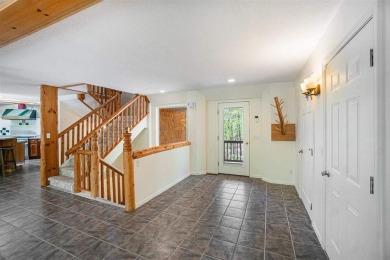 Perched at the crest of a wooded hill, this distinctive on Birchwood Farms Golf and Country Club in Michigan - for sale on GolfHomes.com, golf home, golf lot