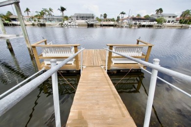 One or more photo(s) has been virtually staged. NO SHOES....NO on Gulf Harbors Golf Course in Florida - for sale on GolfHomes.com, golf home, golf lot