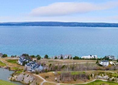 Indulge in the pinnacle of elegance and serenity with this on Bay Harbor Golf Club in Michigan - for sale on GolfHomes.com, golf home, golf lot