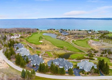 Indulge in the pinnacle of elegance and serenity with this on Bay Harbor Golf Club in Michigan - for sale on GolfHomes.com, golf home, golf lot