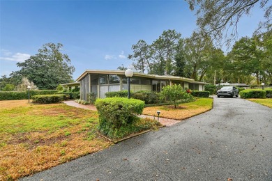 One-of-a-Kind Mid-Century home located on nearly one acre of on Rolling Hills Golf Club in Florida - for sale on GolfHomes.com, golf home, golf lot