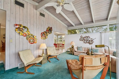 One-of-a-Kind Mid-Century home located on nearly one acre of on Rolling Hills Golf Club in Florida - for sale on GolfHomes.com, golf home, golf lot