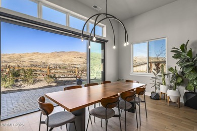 Welcome to this contemporary Somersett home located in the gated on Somersett Country Club in Nevada - for sale on GolfHomes.com, golf home, golf lot