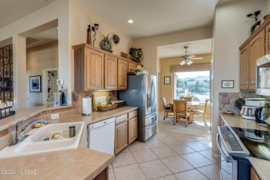 VIEWS, VIEWS, VIEWS and Awesome Windows. This home is located on on Quail Creek Country Club  in Arizona - for sale on GolfHomes.com, golf home, golf lot