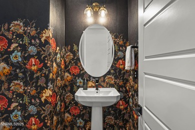 Welcome to this contemporary Somersett home located in the gated on Somersett Country Club in Nevada - for sale on GolfHomes.com, golf home, golf lot