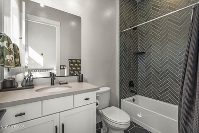 Welcome to this contemporary Somersett home located in the gated on Somersett Country Club in Nevada - for sale on GolfHomes.com, golf home, golf lot