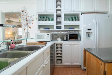 **OPEN CONCEPT, FLOOR TO CEILING PANTRY, PLANTATION SHUTTERS on Sandpiper Golf Club in Florida - for sale on GolfHomes.com, golf home, golf lot