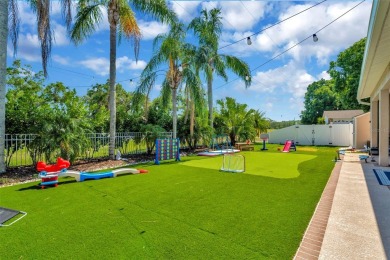 GORGEOUS CORNER-LOT HOME WITH STUNNING UPDATES  RARE 3-CAR on Northdale Golf and Tennis Club in Florida - for sale on GolfHomes.com, golf home, golf lot