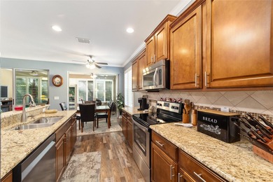 Your home search ends with this maintenance-free Alexander model on Stone Creek Golf Club in Florida - for sale on GolfHomes.com, golf home, golf lot