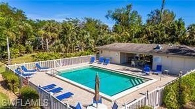 2 Bed + Den | 2 Bath | End-Unit Condo with Water & Golf Course on The Forest Country Club in Florida - for sale on GolfHomes.com, golf home, golf lot