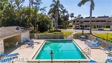 2 Bed + Den | 2 Bath | End-Unit Condo with Water & Golf Course on The Forest Country Club in Florida - for sale on GolfHomes.com, golf home, golf lot